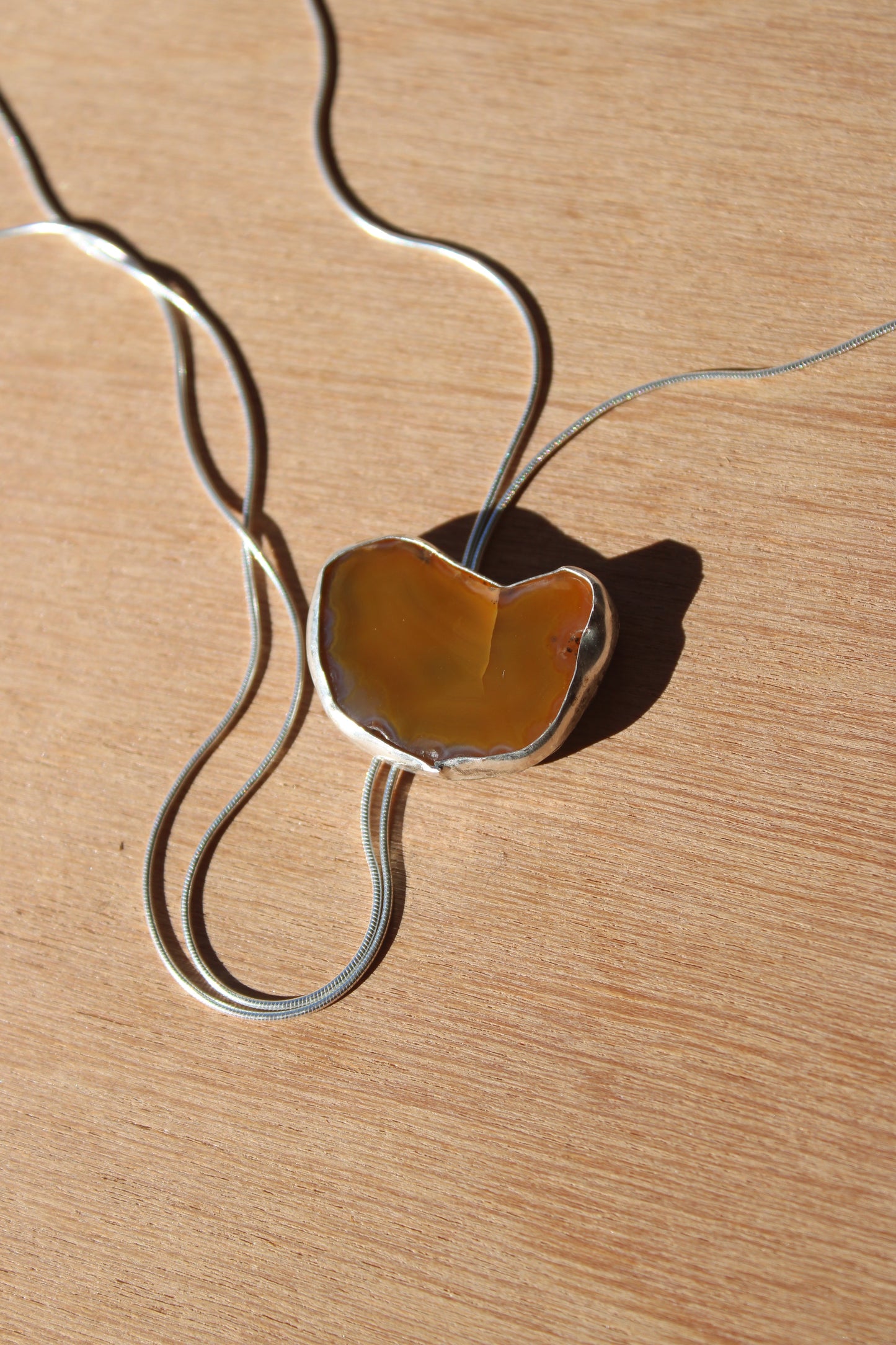 crescent bolo tie